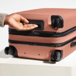 The Bigger Carry-On Flex in Clay Pink